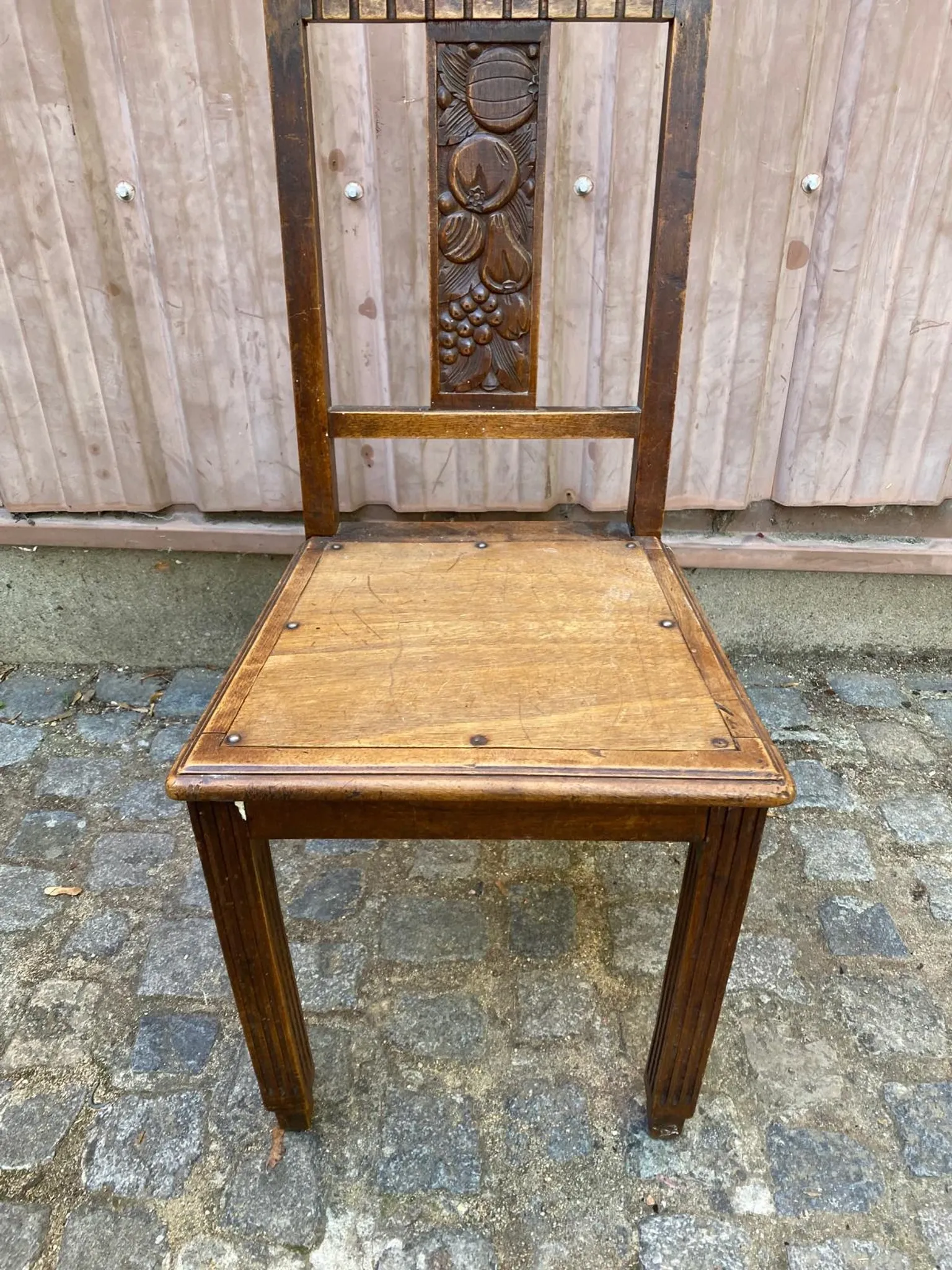 Vintage Art Deco chair in carved oak from the 1930s.