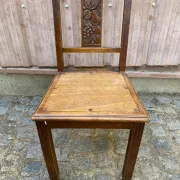 Vintage Art Deco chair in carved oak from the 1930s.