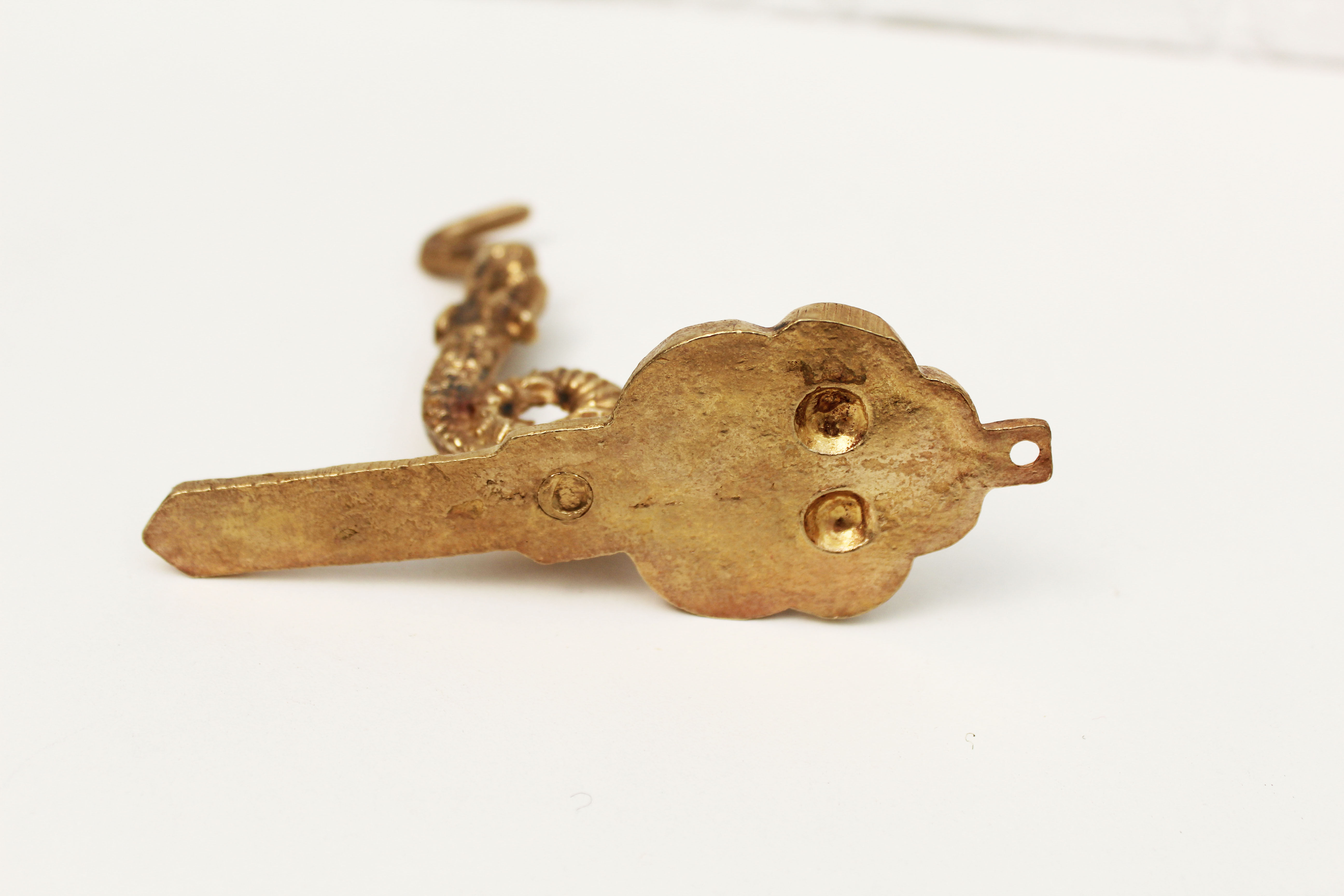 Coat hanger in rococo style, fish, dragon, dutch man and woman