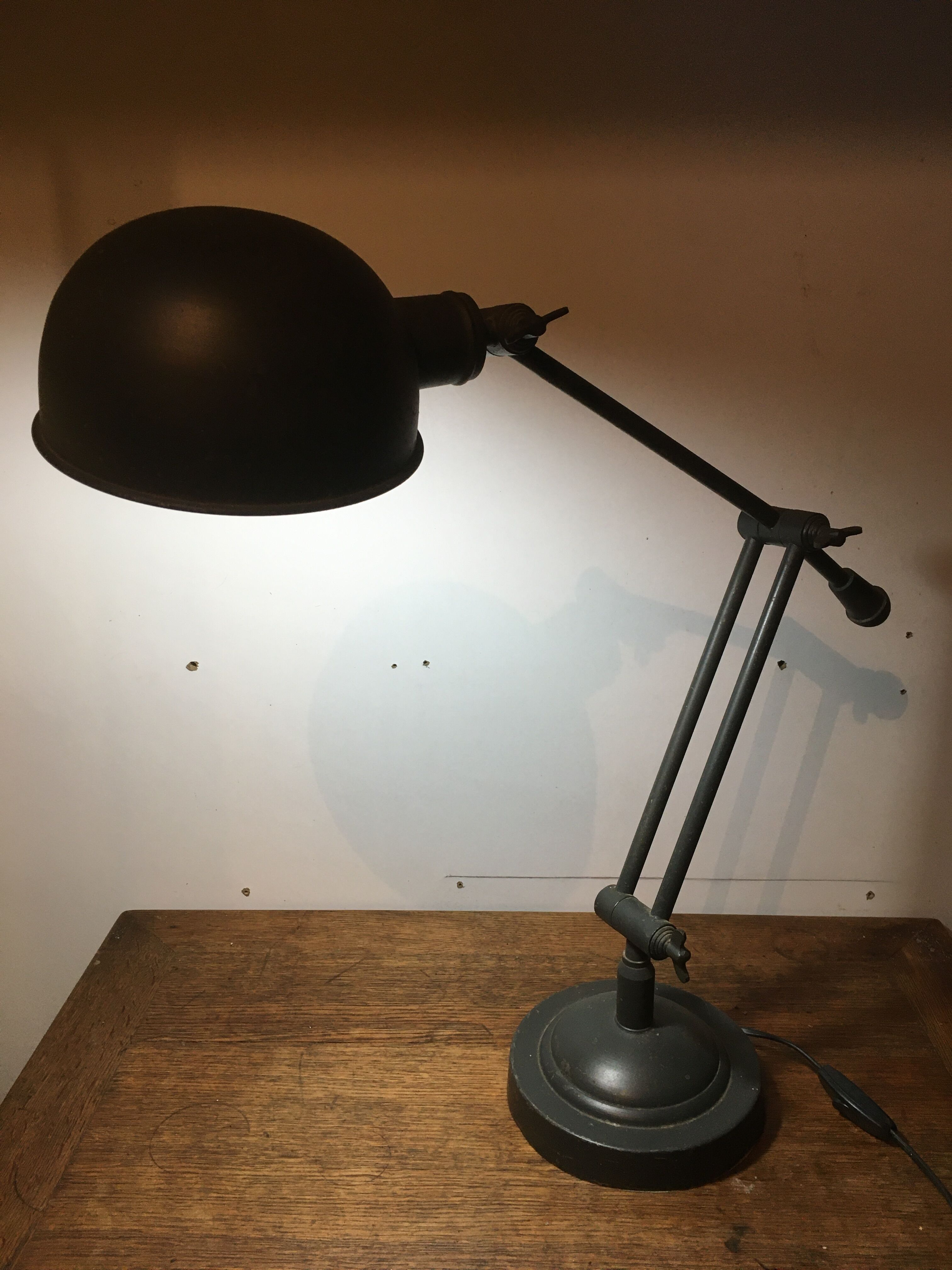 Industrial-style articulated metal desk lamp
