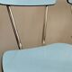 4 blue Formica chairs