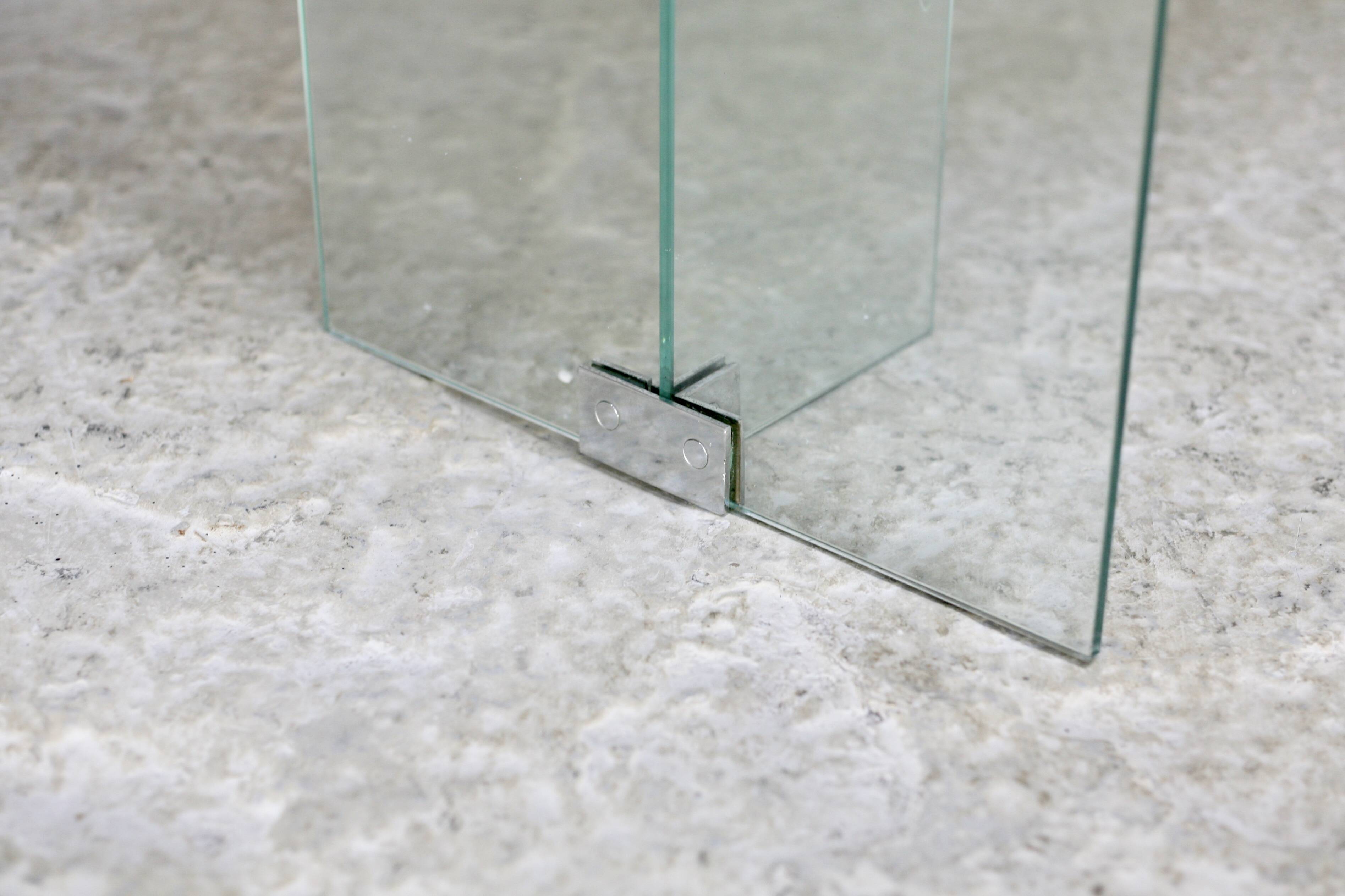 Modernist console, 1960s, glass base, wooden and fabric top.