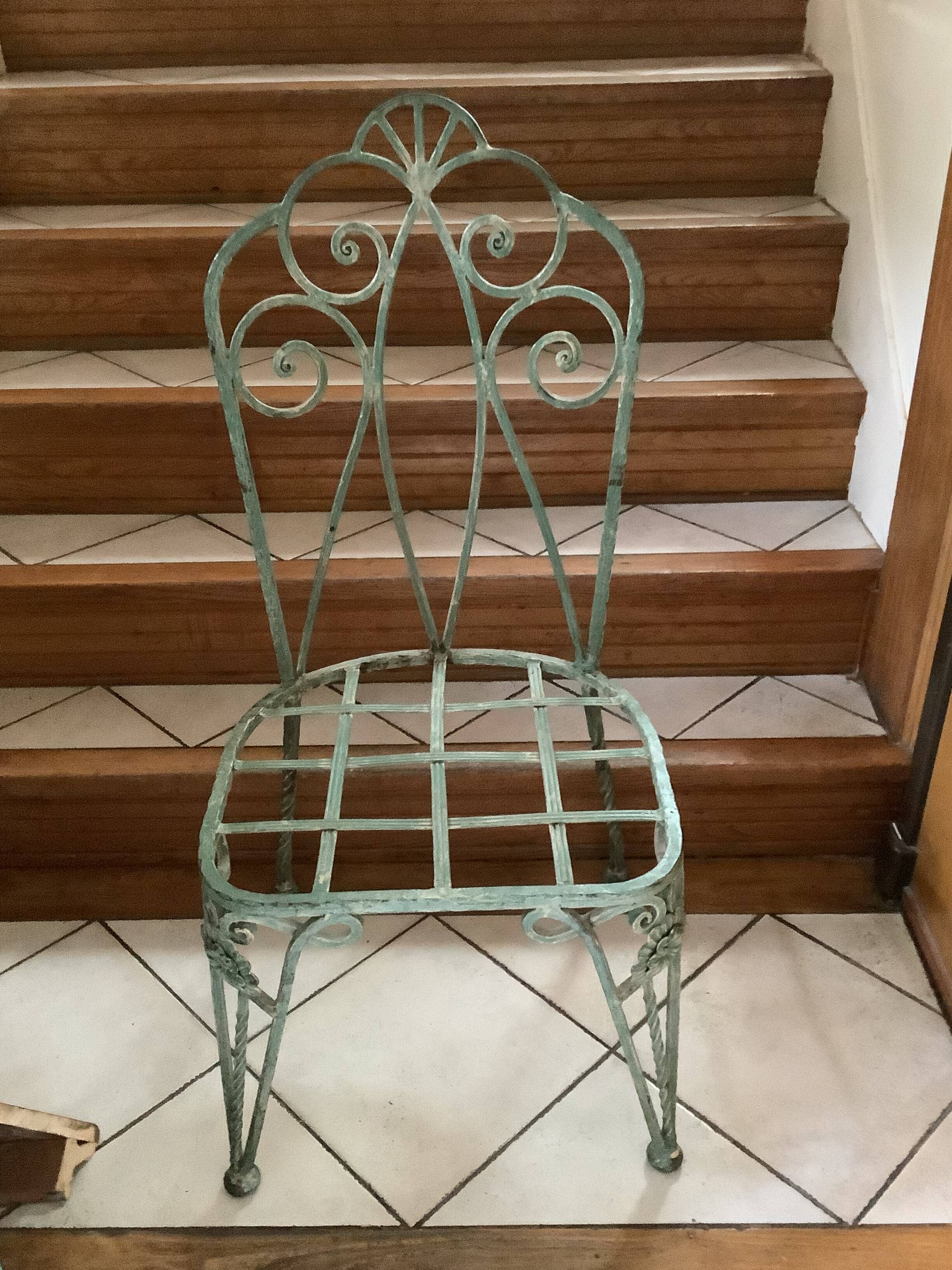 Table et 6 chaises en fer forgé ouvragé