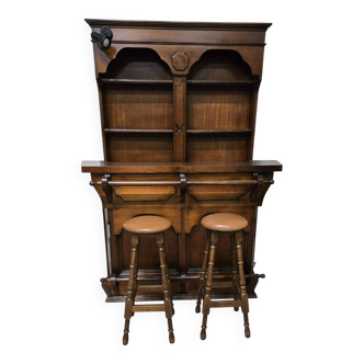 Solid wood bar cabinet with shelves and two stools.