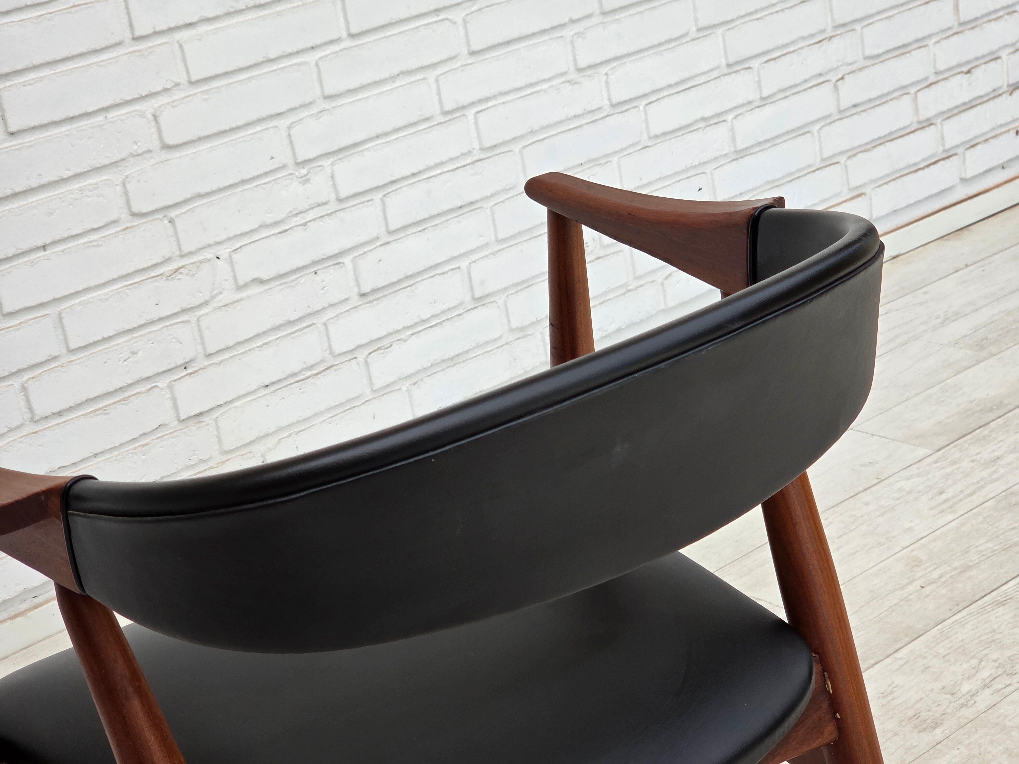 1960s, Danish armchair. Teak wood, black artificial leather.