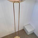 Old golden brass floor lamp with Italian design bulb from the 70s vintage