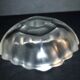 Lalique glass ashtray bowl with frosted finish, engraved with wave design, signed Lalique.