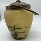 Old enameled glass cookie jar with mill decor