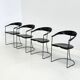 Ensemble de 8 chaises de salle à manger vintage Arrben Ursala en cuir noir.