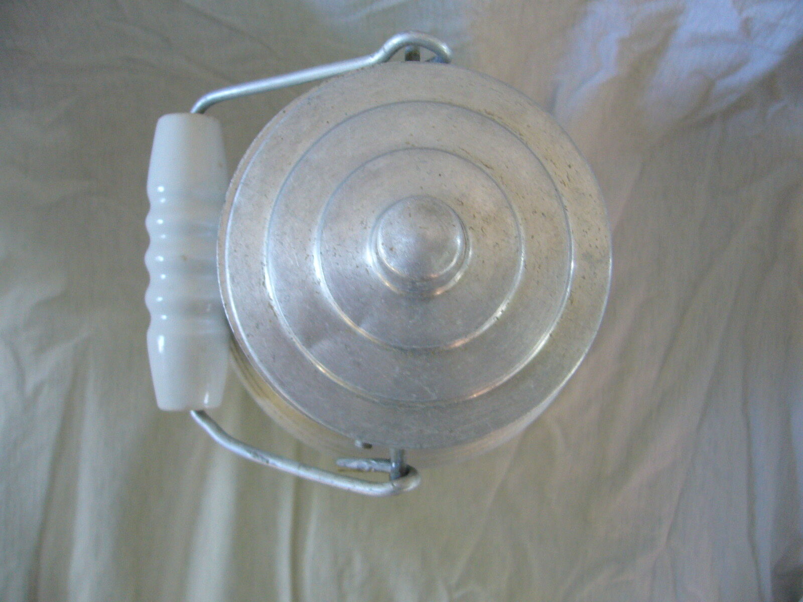 Old aluminum milk pot