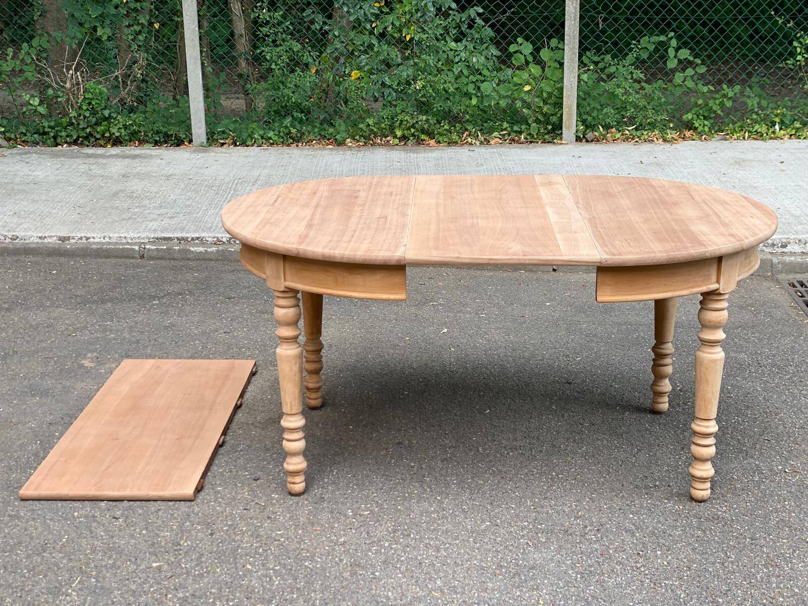 Round extendable dining table stripped in solid cherry wood France 1950