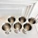 6 vintage stainless steel ice cream cups in the shape of a tumbler.