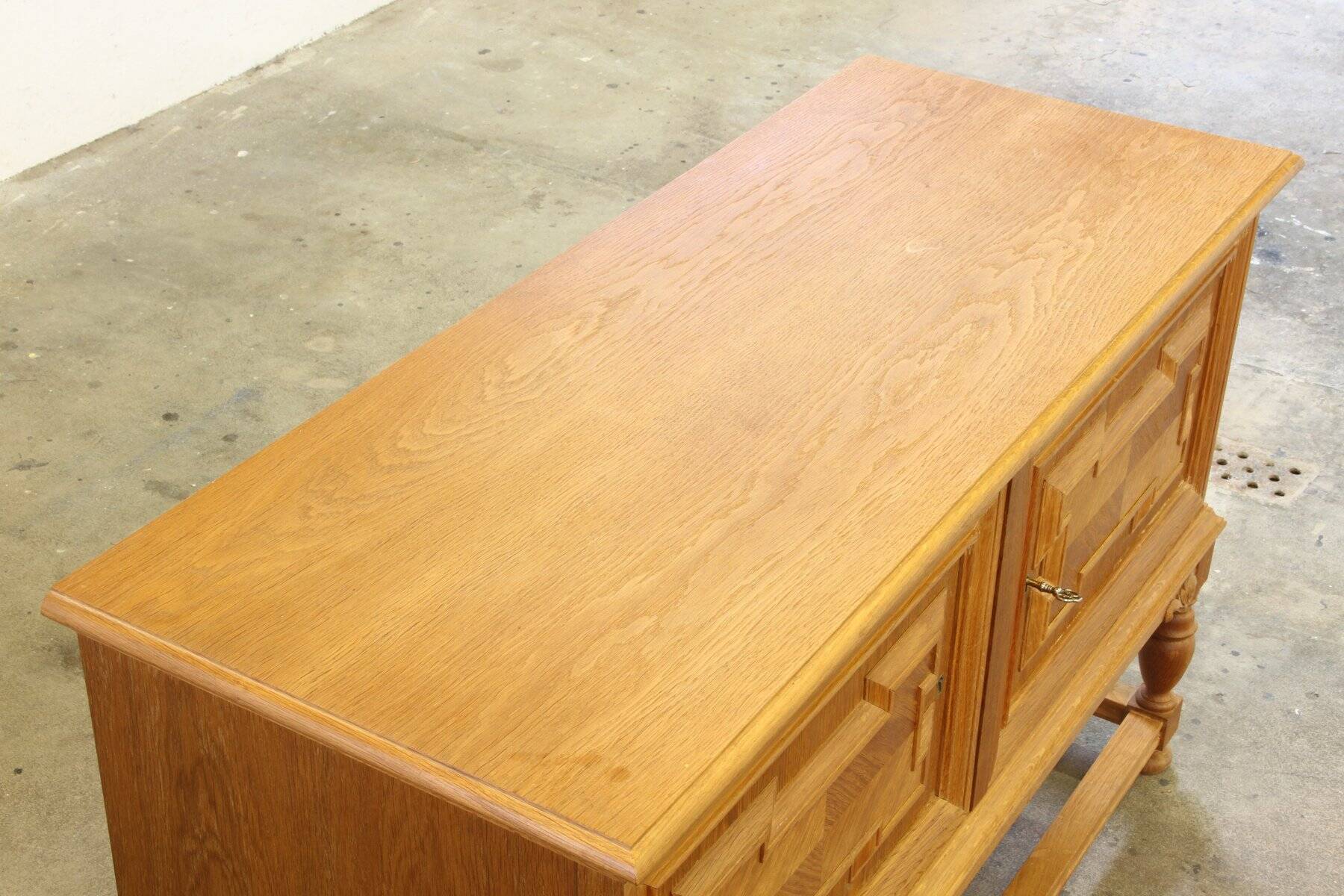 Vintage low sideboard in oak by Henning Kjærnulf, 1960s
