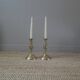 Pair of brass candlesticks in gold metal, ethnic tribal decoration, bohemian artisanal production
