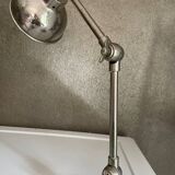 Articulated silver lamp