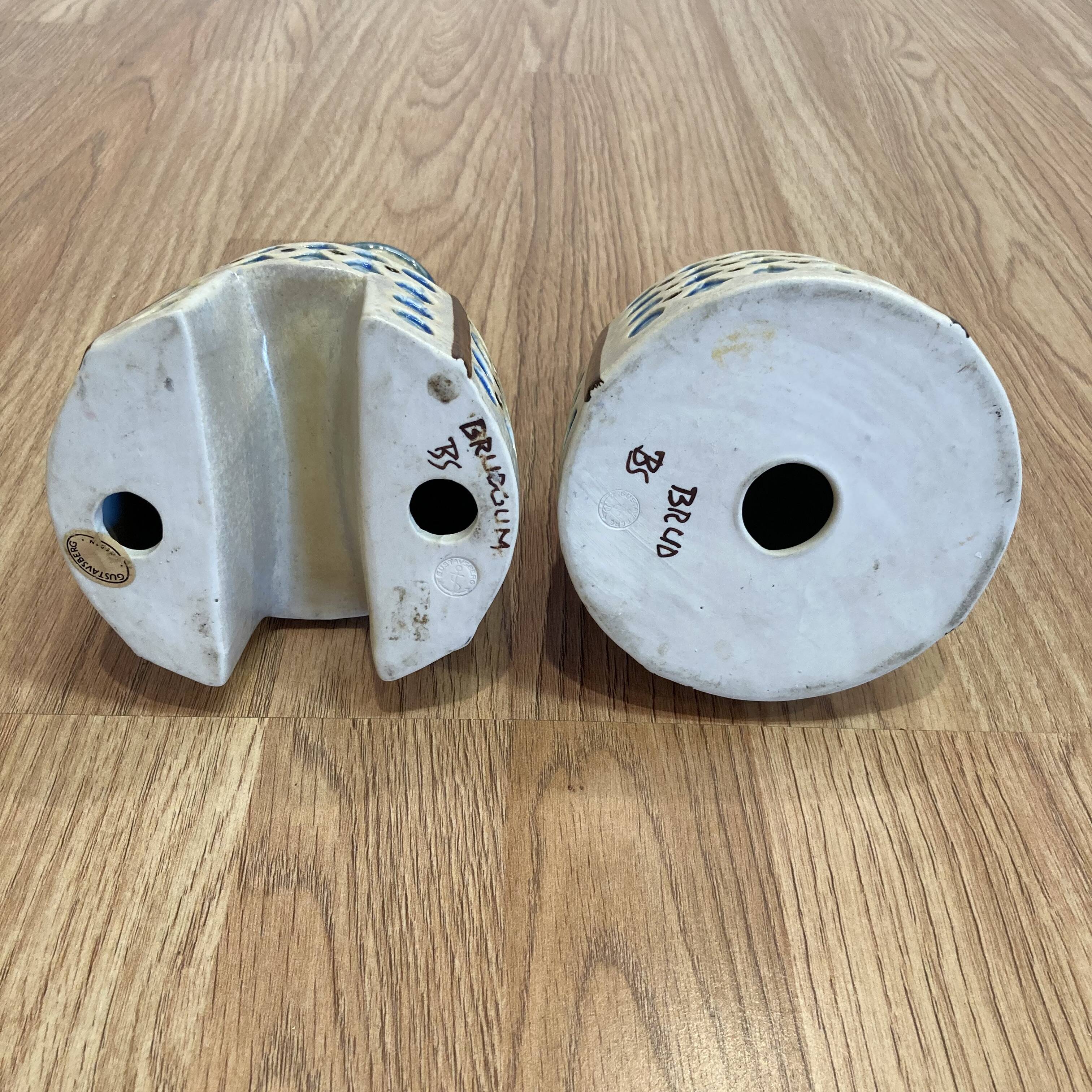 A PAIR OF CANDLEHOLDERS SIGNED "SCANDINAVIAN DESIGN" 1950.