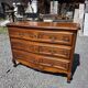 Curved commode in Louis XV style made of cherry wood.
