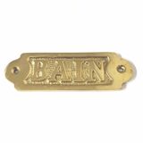 Brass bathroom door plate