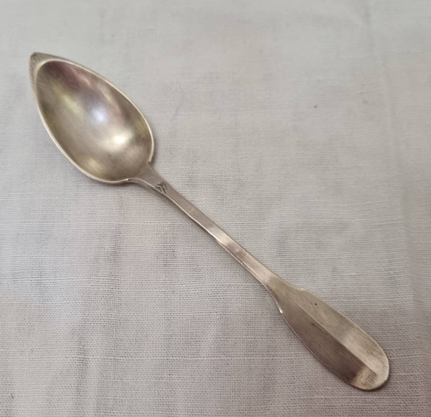 Solid silver spoon, neck brace