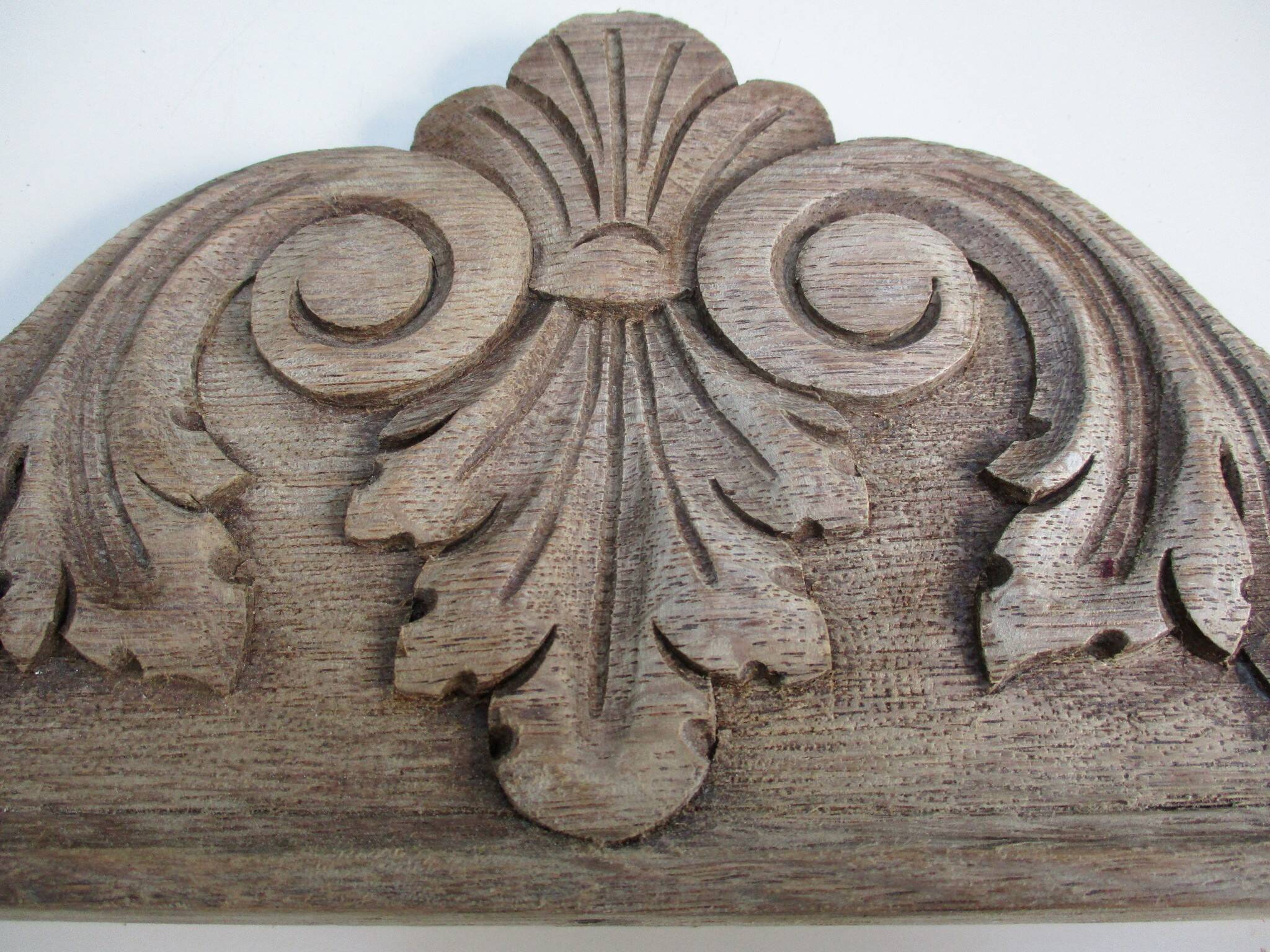 Old carved wooden pediment