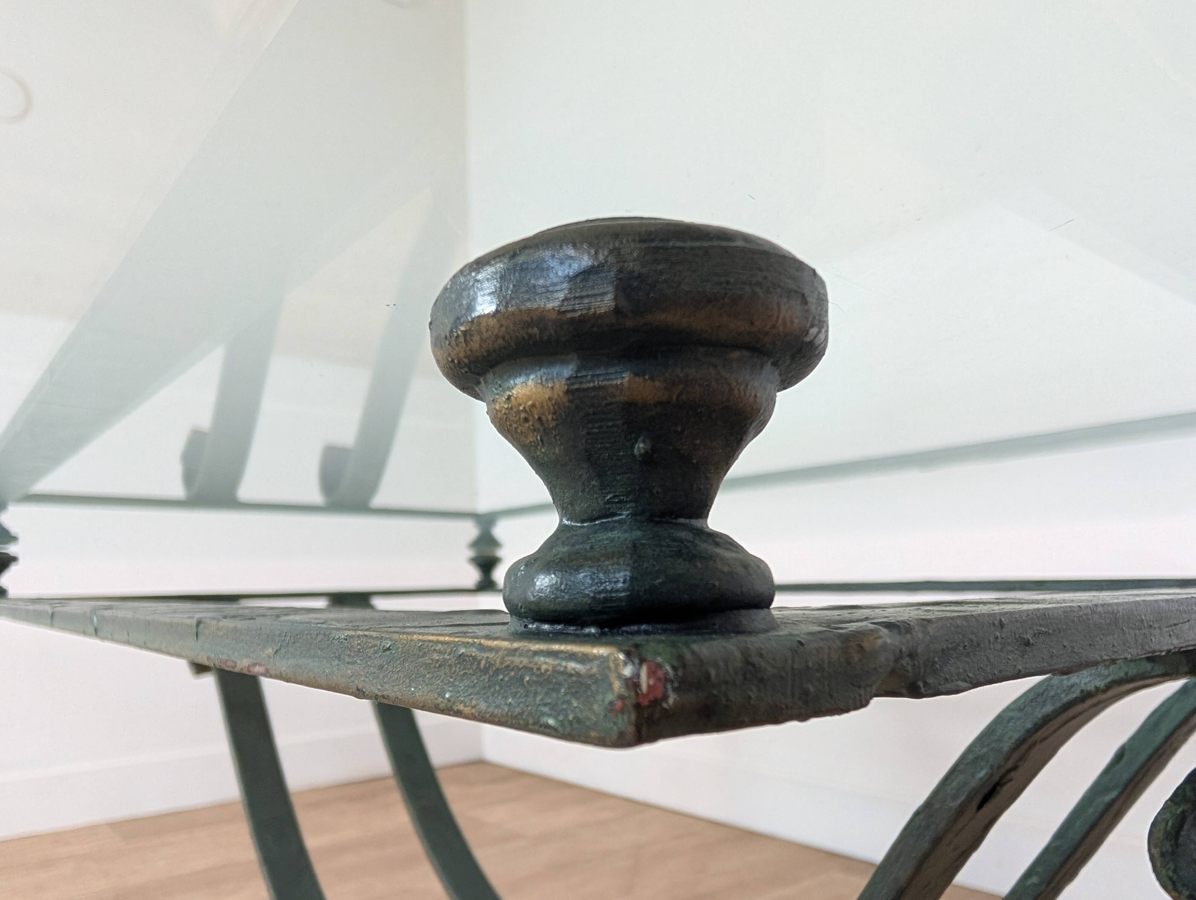 Wrought iron and glass coffee table