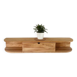 Floating entrance console in solid recycled beech and its practical storage