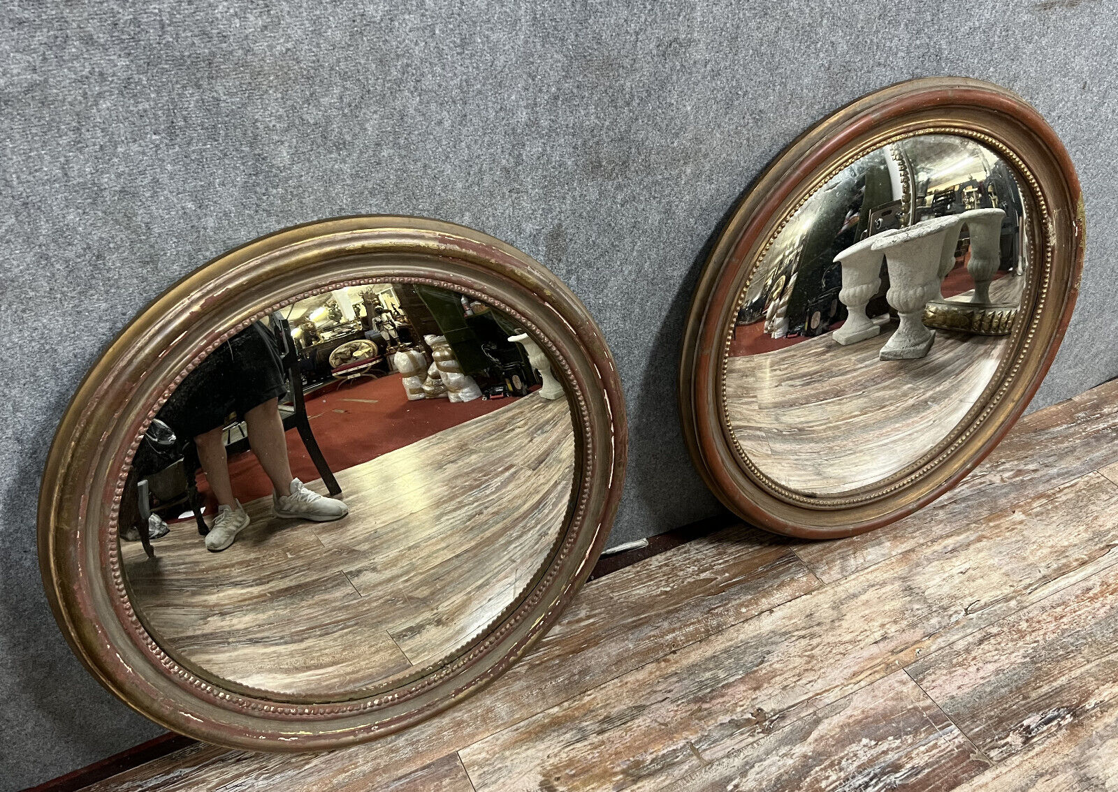 Pair of mirrors called "witch's eye" with patinated golden frame style Napoleon III