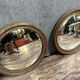 Pair of mirrors called "witch's eye" with patinated golden frame style Napoleon III