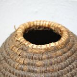 Old basket, burgundy straw and bramble, woven basket, interior decoration, pantry, flowerpot