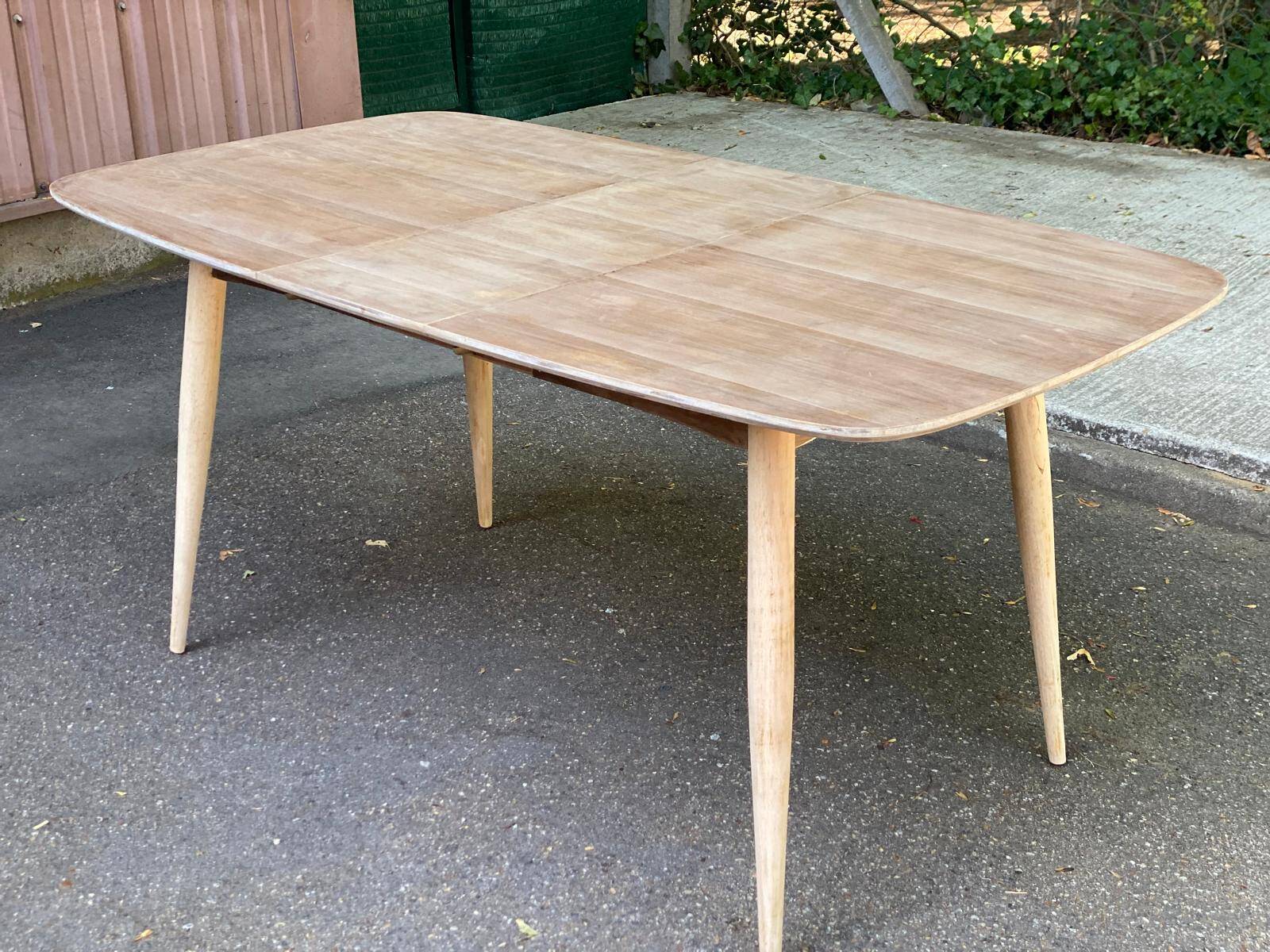 Renovated Scandinavian extendable dining table in teak and veneer from 1980.