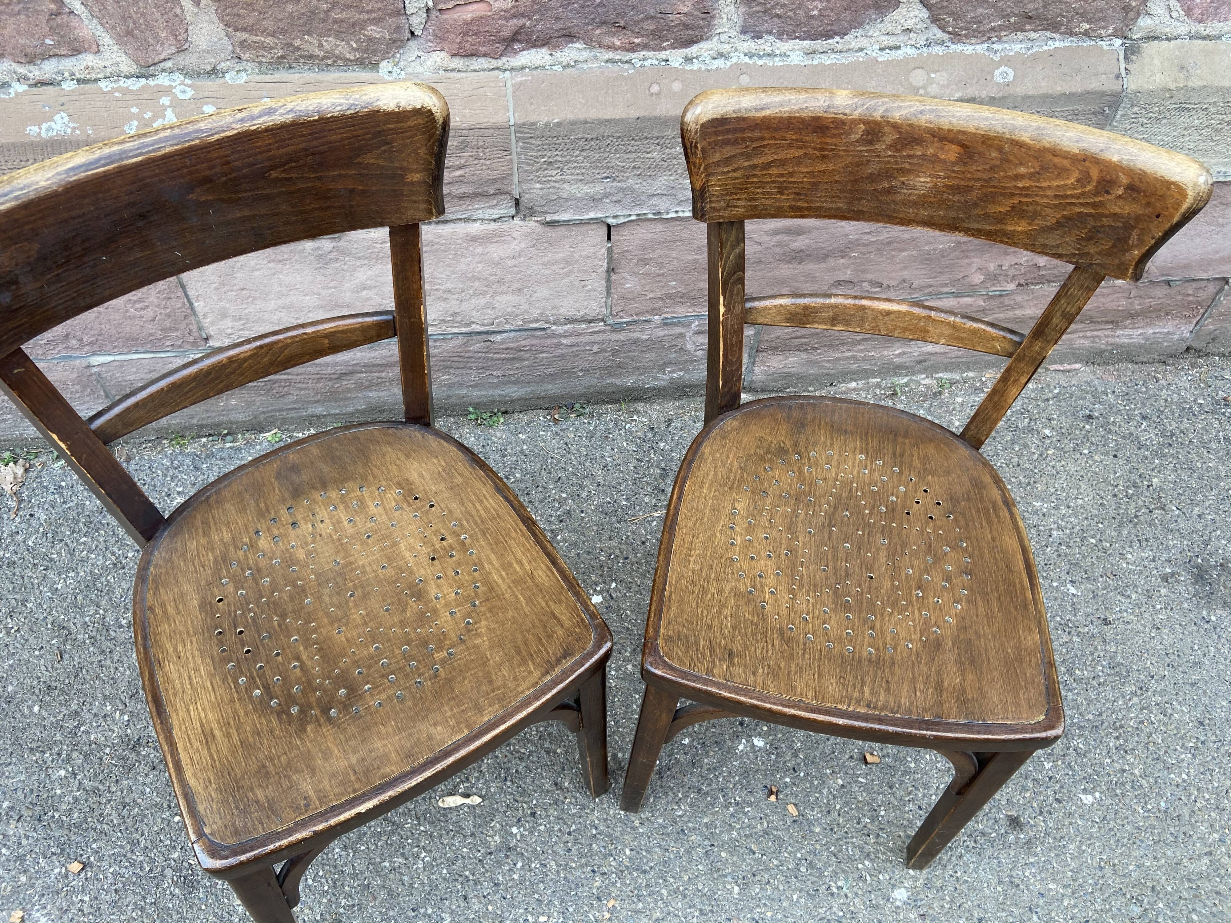 Pair of curved wooden brasserie chair