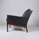 Leather and rosewood armchair by Kai lyngfeldt-Larsen. Denmark