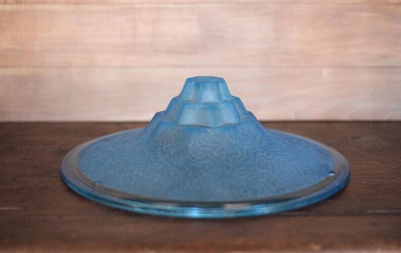 Vintage Art Deco ceiling light, suspension bowl with geometric patterns, blue dish, interior decor.
