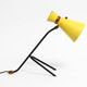 Large Mid Century Modern tripod table lamp with yellow diabolo lampshade