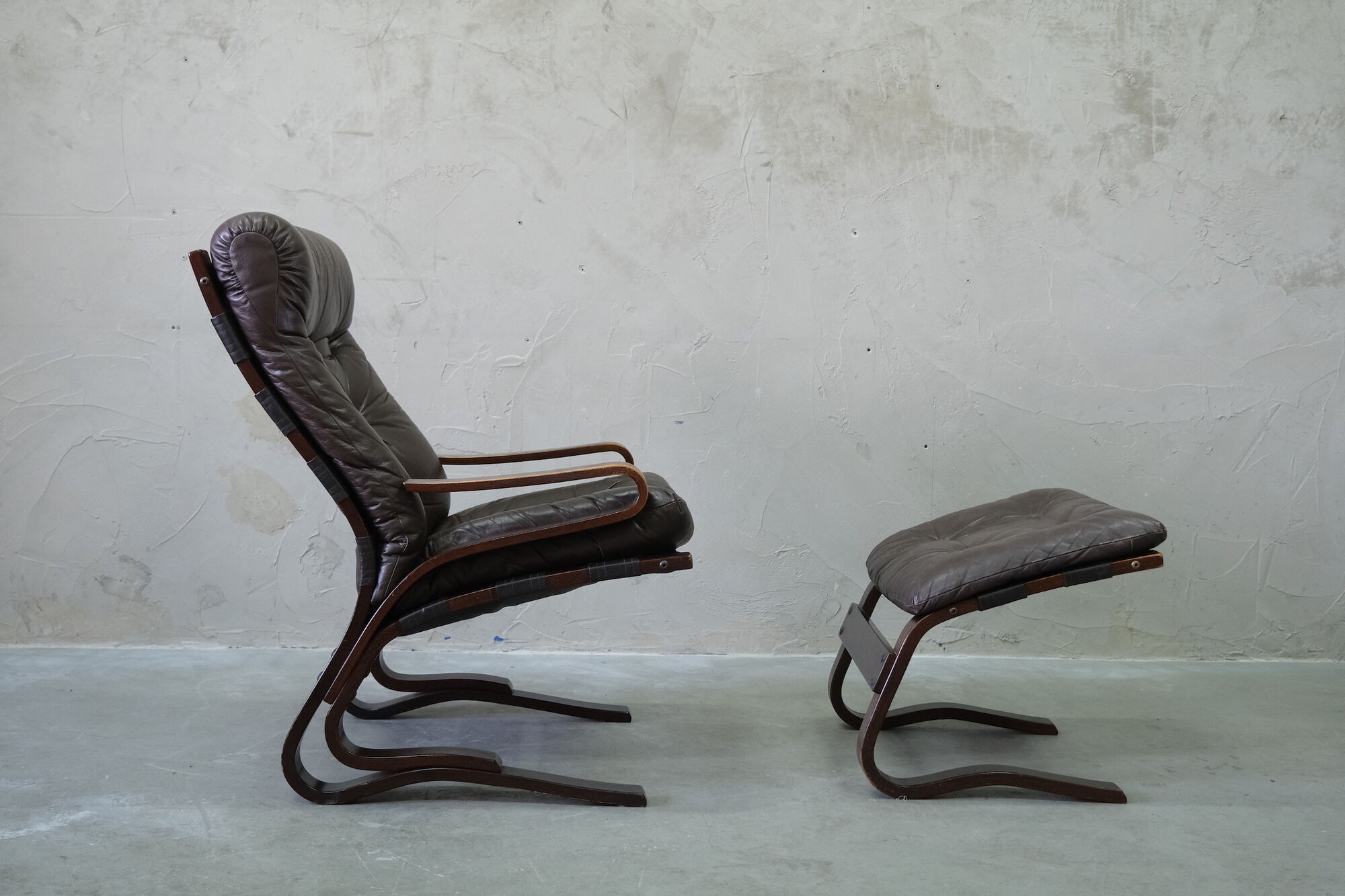 Mid century leather armchair and foot stool by Erda & Nordahl Solheim, Norway 1970's