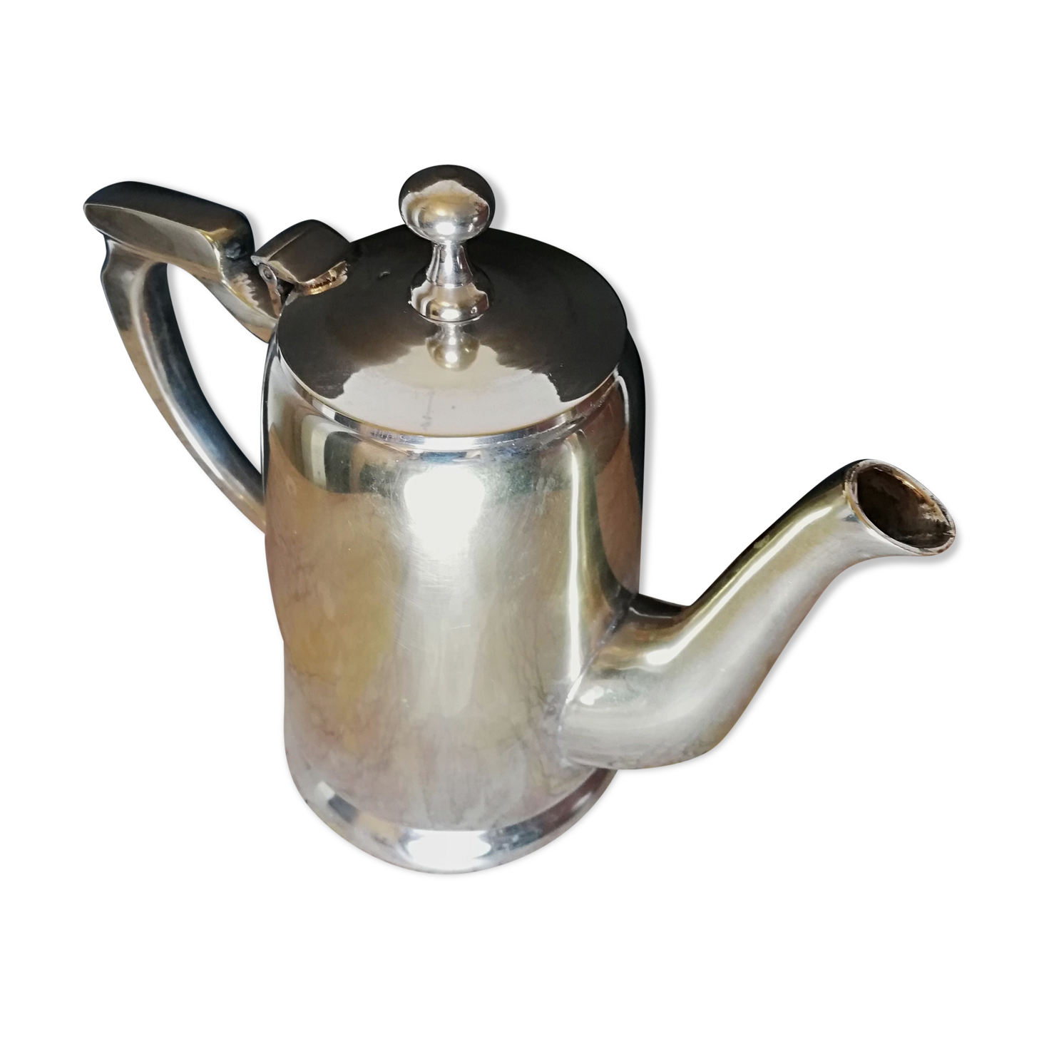 Art deco teapot in silver metal and vermeil reflections