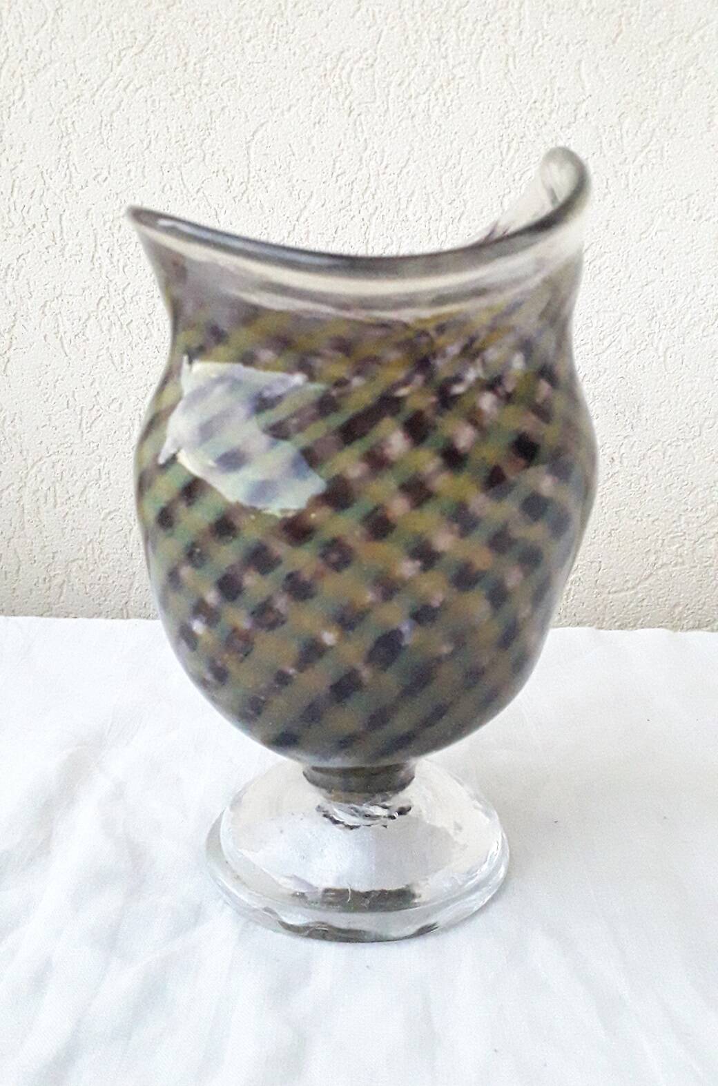 Glass vase on a stand