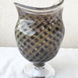 Glass vase on a stand