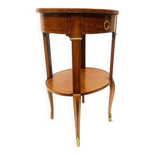 Gueridon ovale en bois de placage et filet de bois noir XX siècle