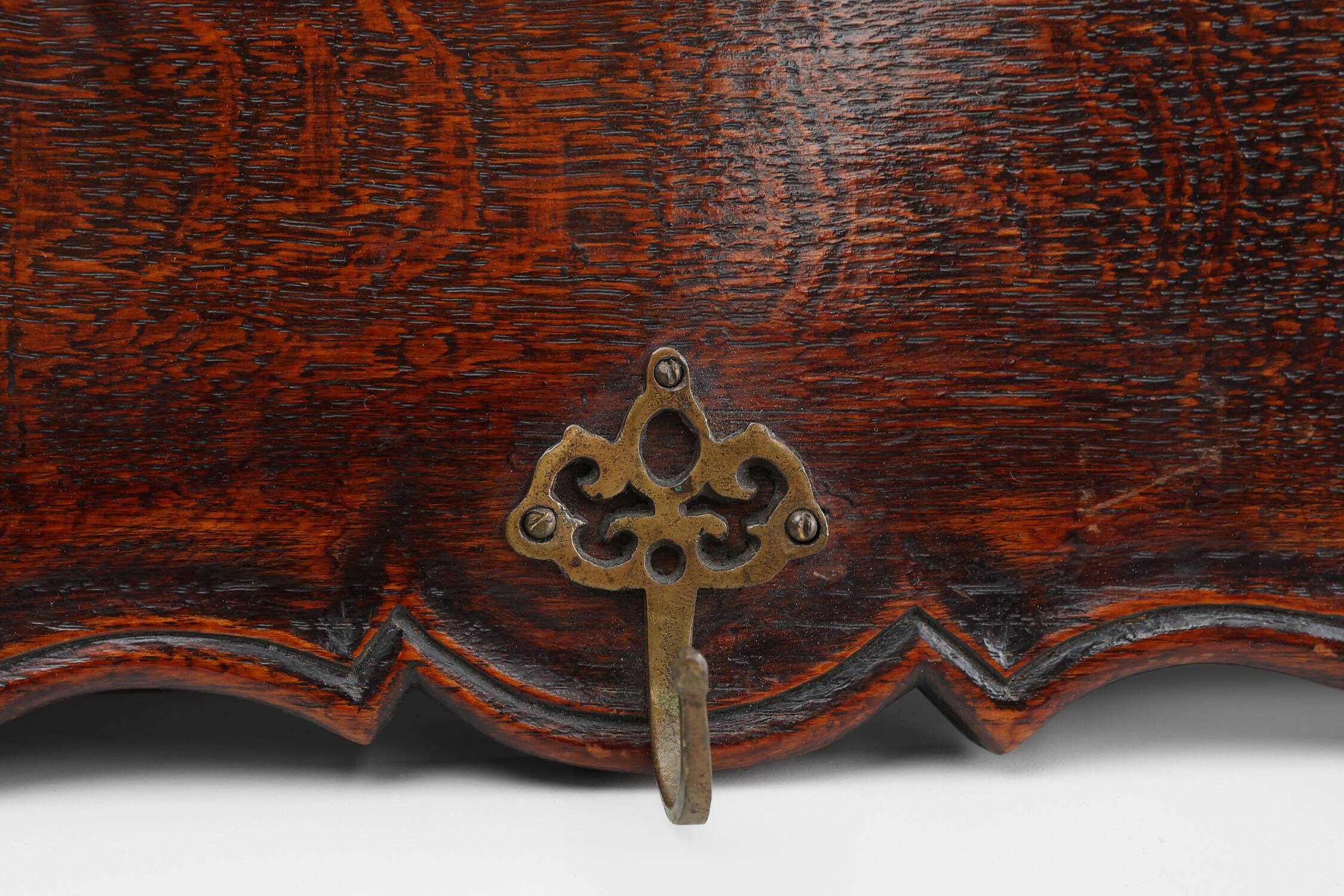 Art Nouveau style coat rack in oak with brass hooks, France ca. 1915