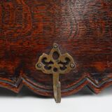 Art Nouveau style coat rack in oak with brass hooks, France ca. 1915