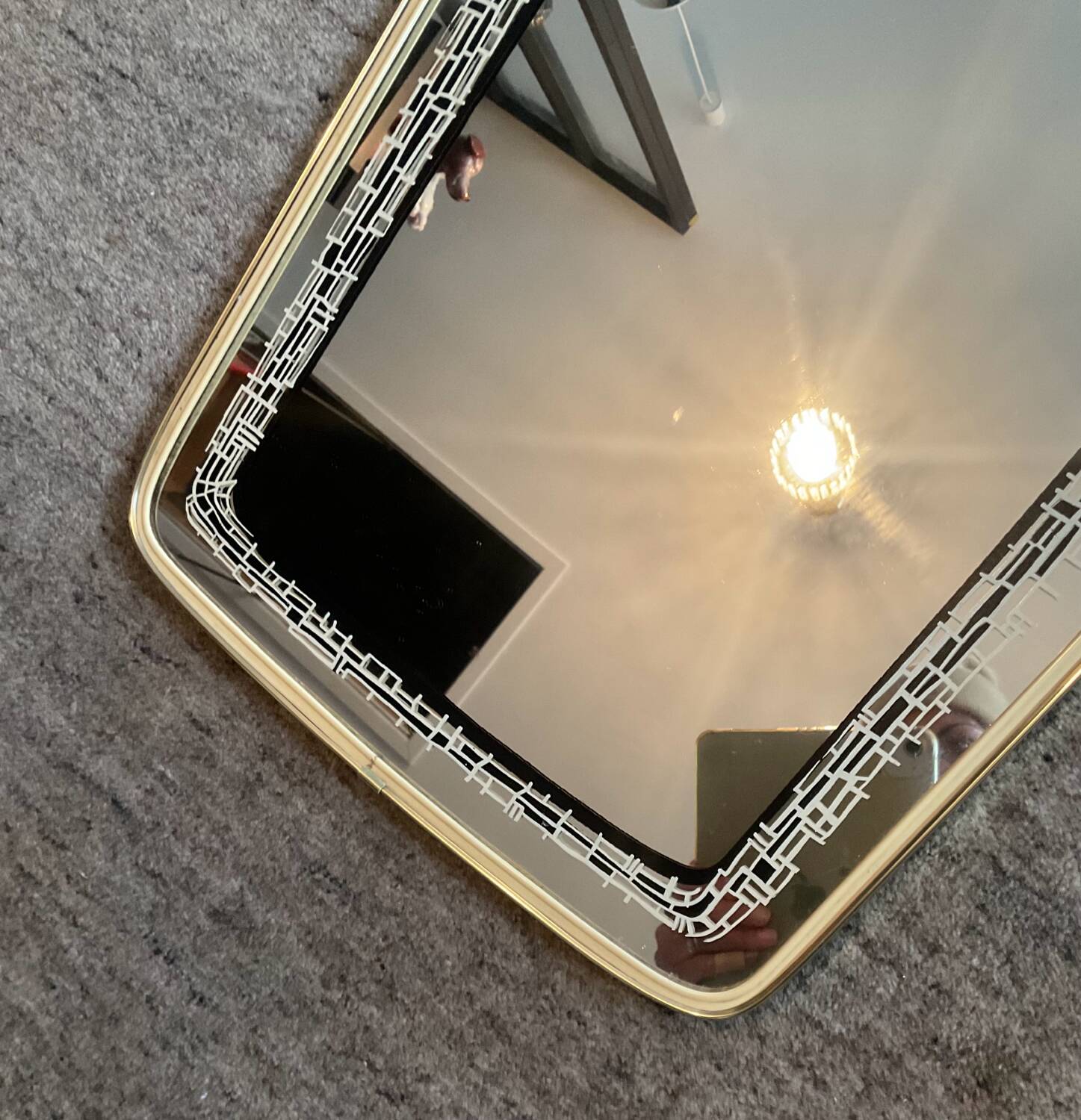 Asymmetrical free-form mirror from the 1970s