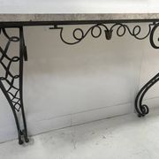 Art Deco console in hammered wrought iron, 20th century.
