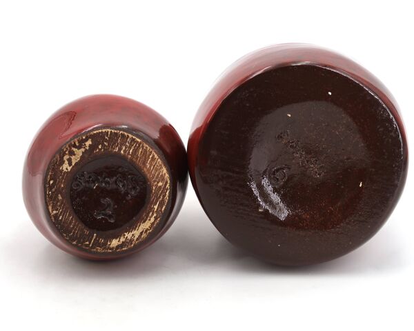 Deux vases rouge sang de boeuf en céramique de Max Idlas, années 60