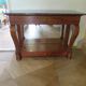 Empire/Restoration style console table with scrolled ends, mirrored back, and claw feet.