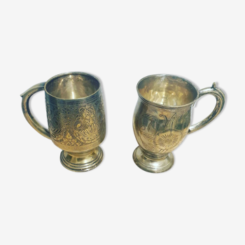 Two old metal cups