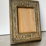 Antique brass metal picture frame in baroque style