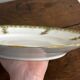 Vintage round green Limoges porcelain serving platter with gold trim