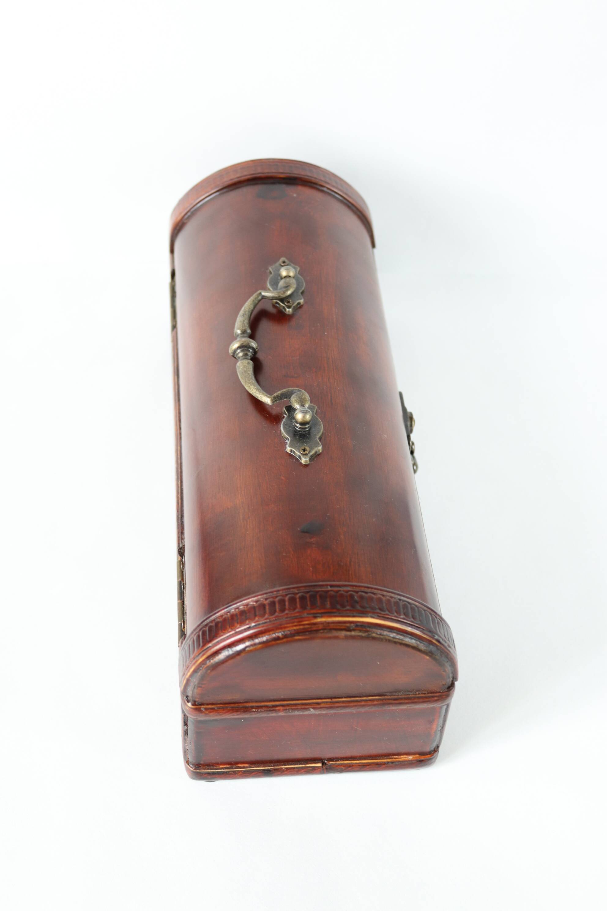 small wooden and brass trunk
