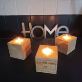 Set of three wooden candlesticks